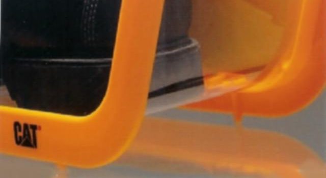 Shoe display Black shoe partially visible within a bright orange frame.